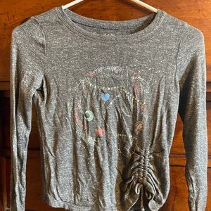A girls size 8. Brand Mudd. Long sleeved.